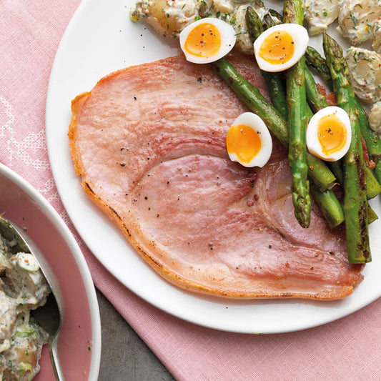 GAMMON STEAKS WITH ASPARAGUS, QUAIL EGGS & POTATO SALAD