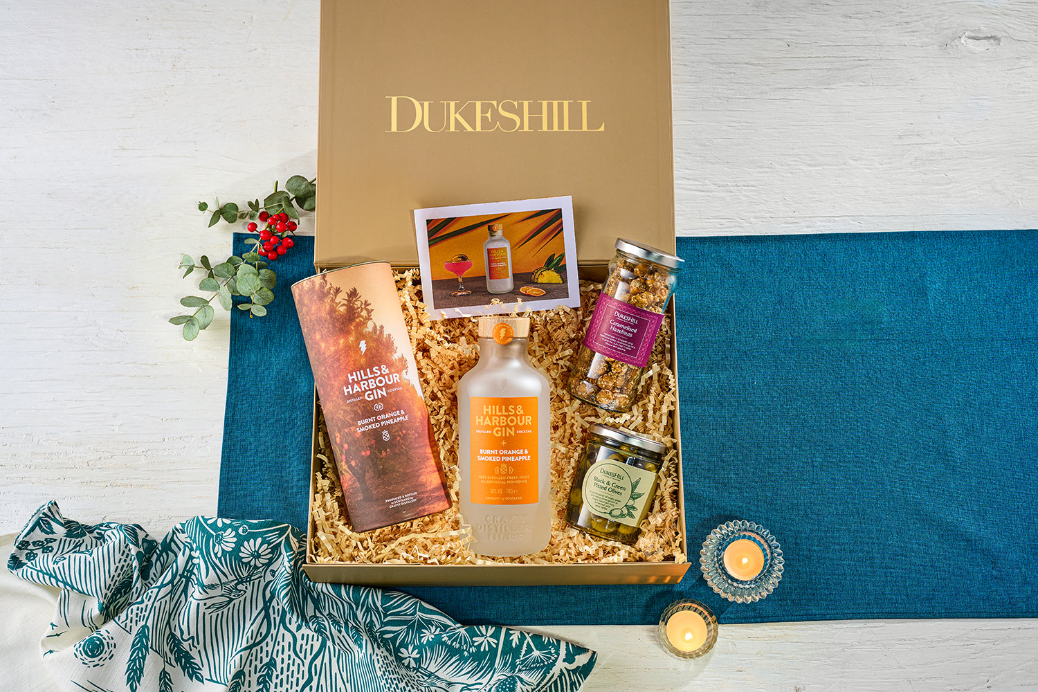 Hills & Harbour Burnt Orange and Smoked Pineapple Gift set in box with caramelised hazelnuts and black & green pitted olives. 